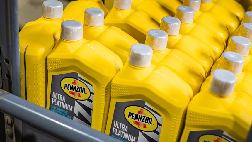 bottles of motor oil on shelf