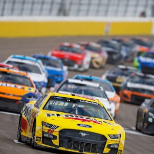 Larry Chen captures Joey Logano in action during a NASCAR race