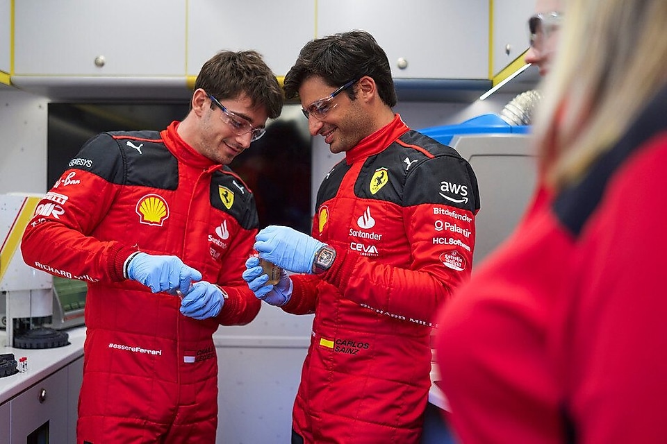 two men in racesuits