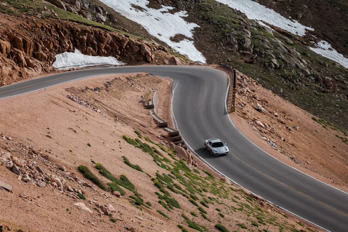 Driving his Ferrari 360 along winding mountain roads reflects Vin's passion for creating unforgettable memories behind the wheel.