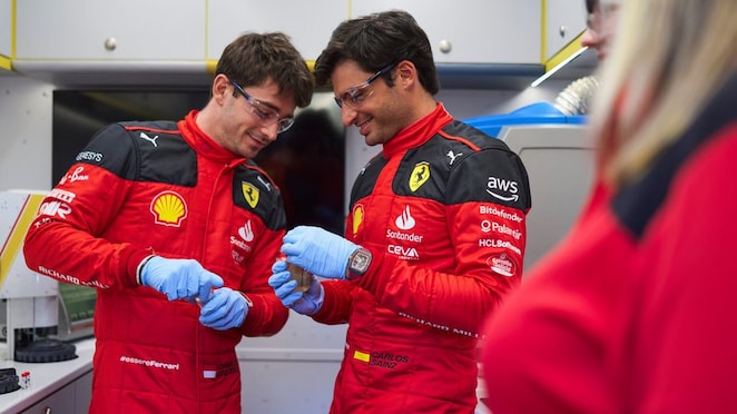 SCUDERIA FERRARI FORMULA 1 DRIVERS CHARLES LECLERC AND CARLOS SAINZ IN THE SHELL TRACKSIDE LAB
