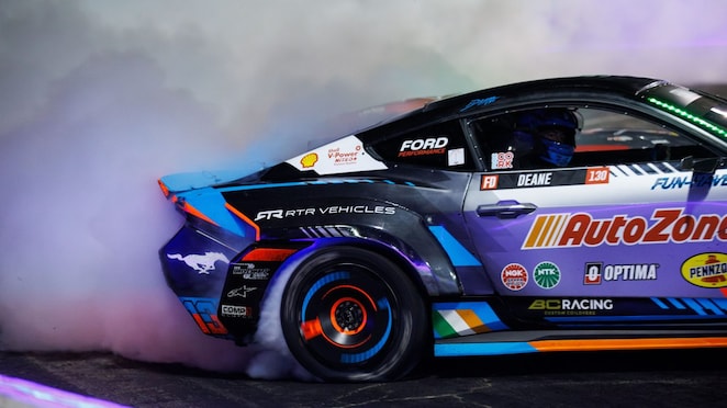 James Deane powers through a high-intensity drift in his AutoZone Ford Mustang RTR Spec 5-FD.