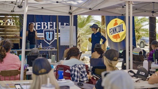 Rebelle U Participants Engaged In A Navigation And Safety Briefing