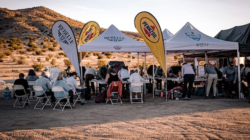 Rebelle U Participants Gather Under Tents For Hands-on Training