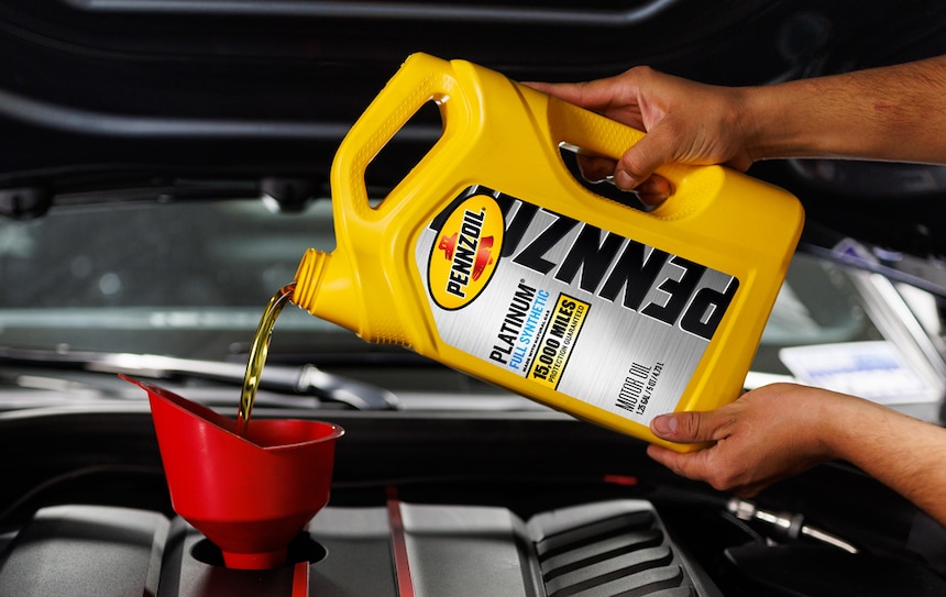 pouring motor oil