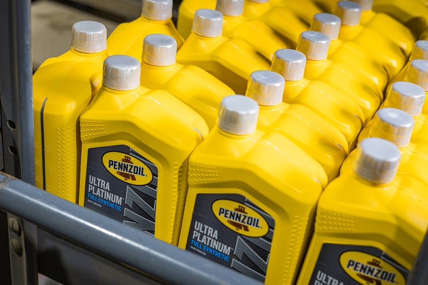 bottles of motor oil on shelf