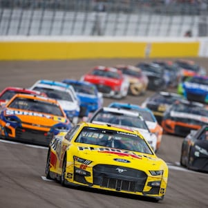 Larry Chen captures Joey Logano in action during a NASCAR race