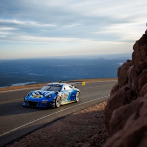 Larry Chen photographs a Pennzoil car navigating the stunning heights of Pikes Peak.