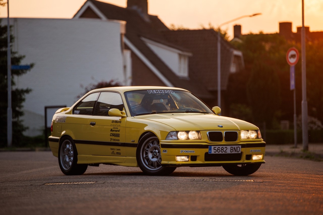Larry Chen’s yellow M3, a striking tribute to classic BMW styling.