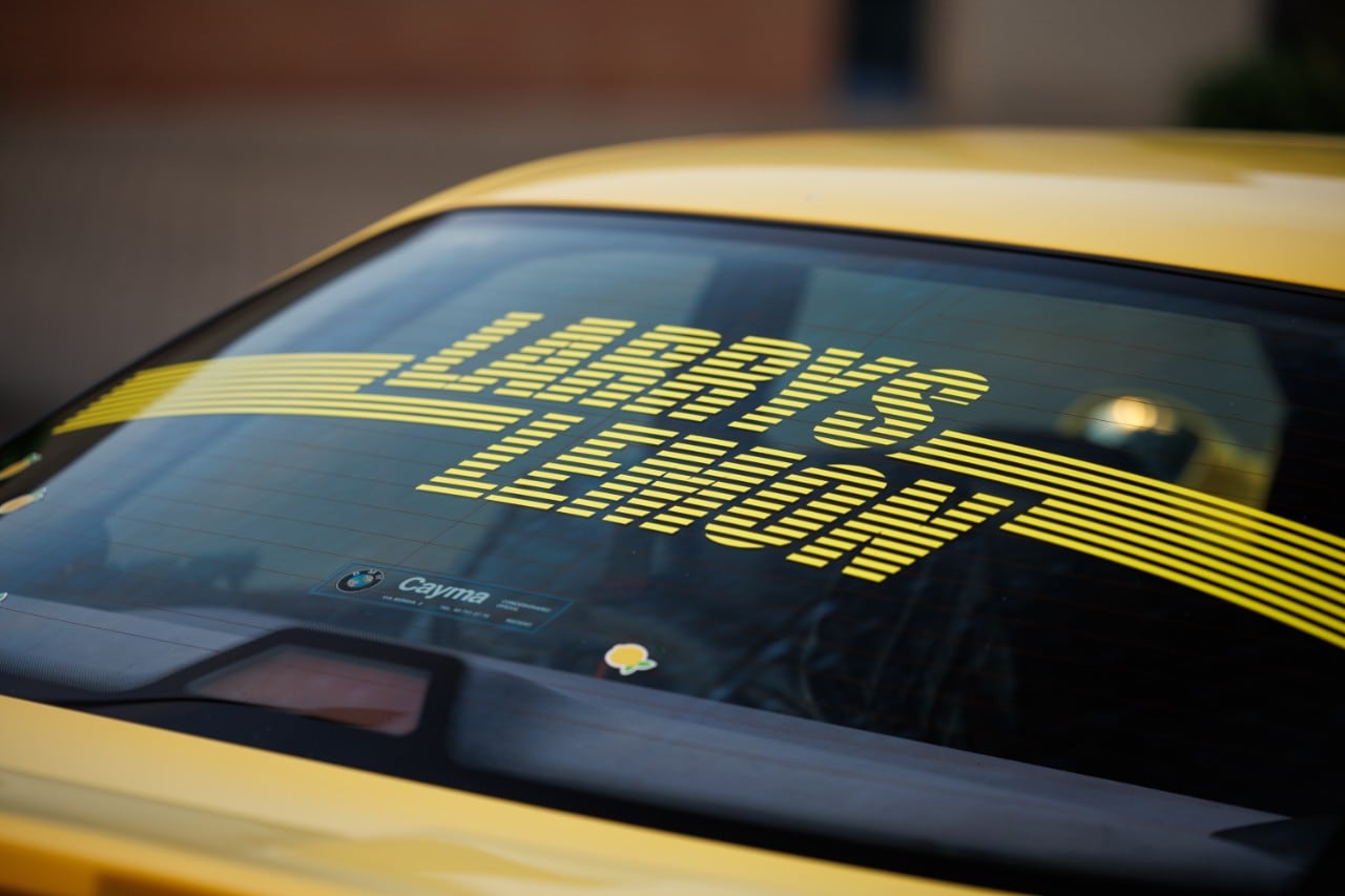 Larry’s Lemon’ proudly displayed on the rear window of the M3.