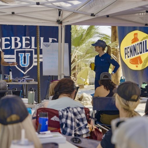 Rebelle U Participants Engaged In A Navigation And Safety Briefing