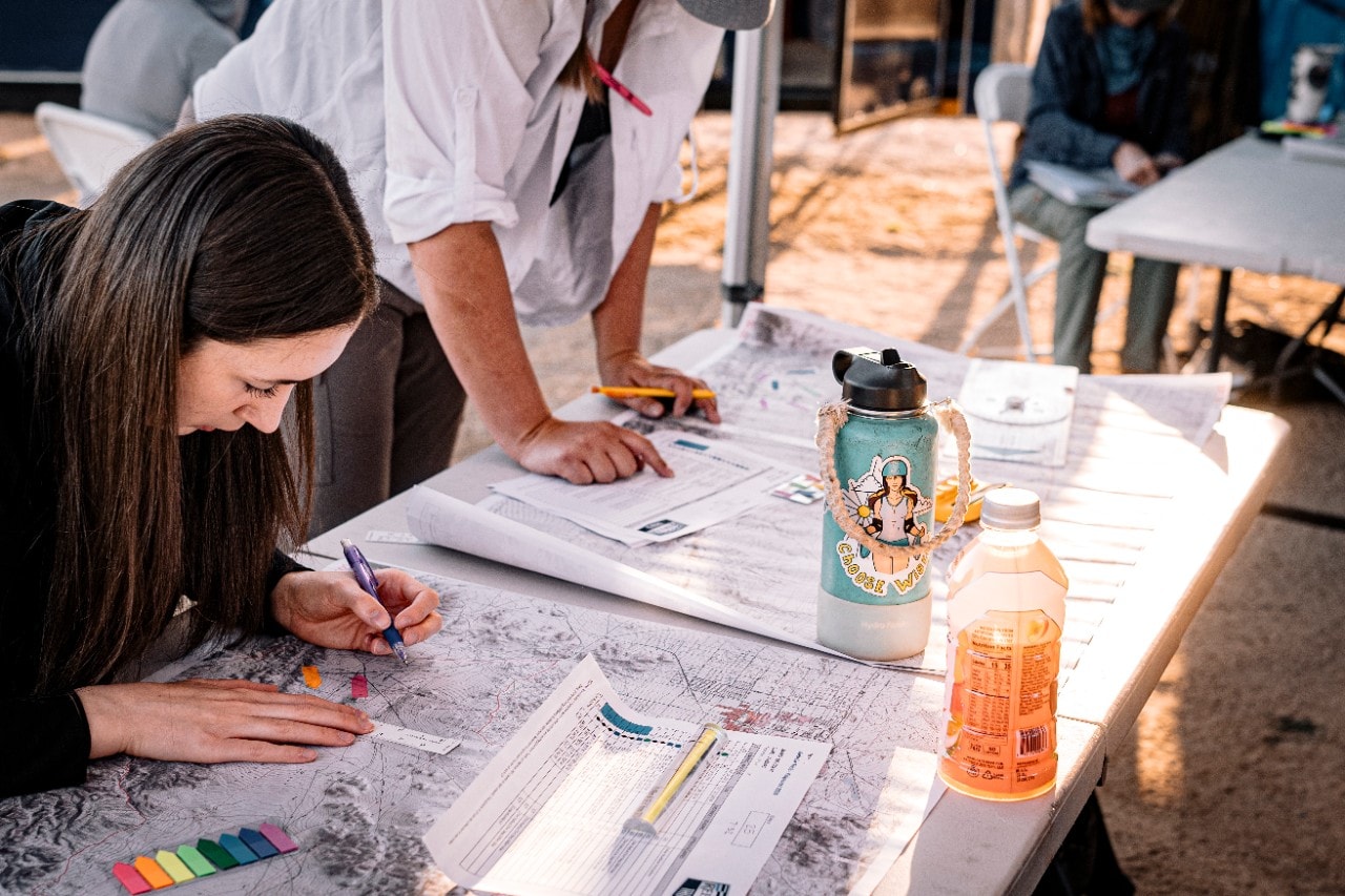 Rebelle U Participants Focusing On Route Planning