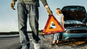 warning triangle sign to be put on the road